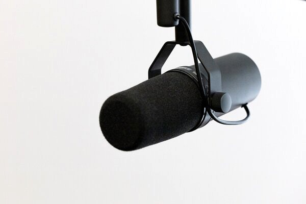 black microphone on white background